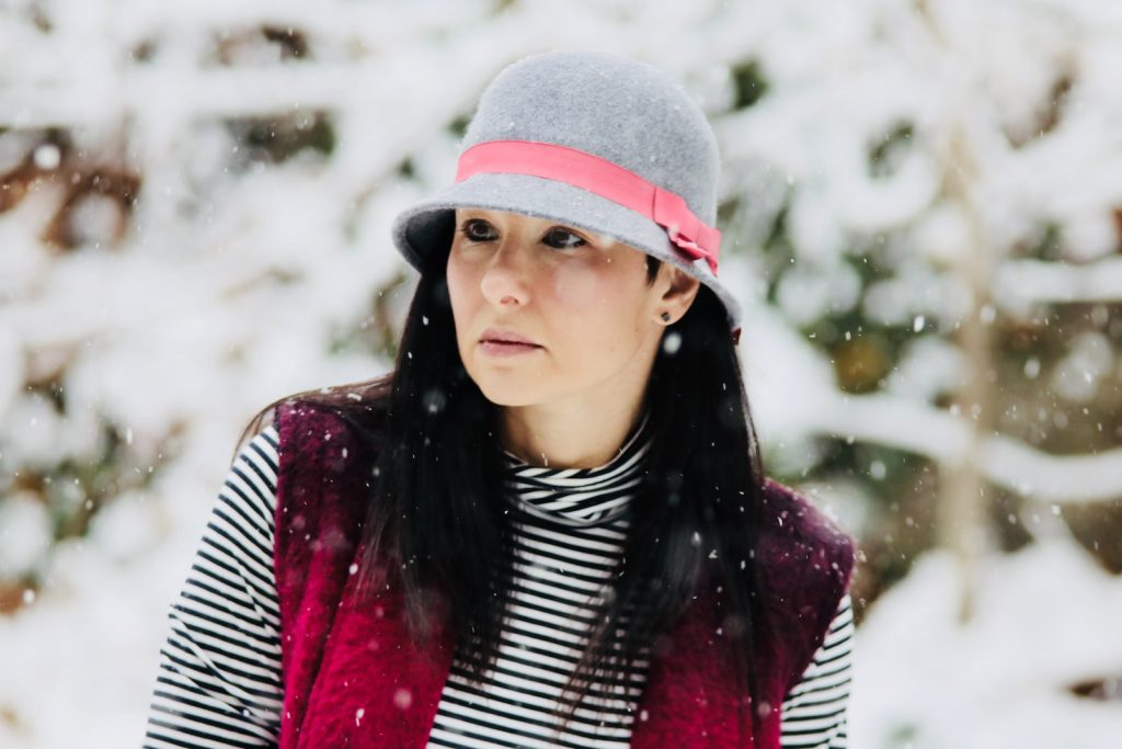 woman looking right side during winter